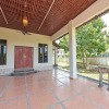 Отель OYO Home 90448 Nurbayu Guest House, фото 28