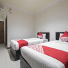 Отель OYO 1114 Hotel Denpasar Makassar, фото 4