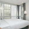Отель Comfortable Deluxe 2BR at The Empyreal Condominium Epicentrum Apartment By Travelio, фото 3