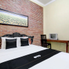 Отель Capital O 93716 Family Guesthouse Syariah, фото 6