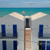 Отель Dolce Mare 6 - Second Floor - Sea Front Large Balcony - Free Wifi and Garage, фото 1