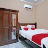 Отель OYO 92223 Alfatar Homestay Syariah, фото 12