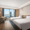 Отель Microtel By Wyndham Qingdao Huangdao, фото 17