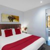 Отель Aura on Flinders Serviced Apartments, фото 5