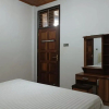 Отель OYO 93706 Penginapan Syariah Hj. Kenan, фото 18