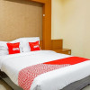 Отель OYO 1740 Tekmira Residence Supratman Syariah, фото 17