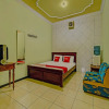 Отель OYO 90031 Villa Papada, фото 25