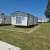 Отель Luxury Static Caravan Sleeps 6 Coopers Beach, фото 19