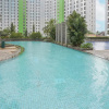 Отель Super OYO Capital O 93910 Asia Rooms @ Green Lake View Ciputat, фото 37