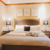Отель Luxo Suites, фото 1