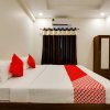 Отель OYO 61576 Lavish Suites в Виджаяваде