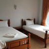 Отель Holiday Guesthouse, фото 6