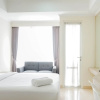 Отель Minimalist and Homey Studio Menteng Park Apartment, фото 2