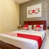 Отель OYO 615 Residence Puri Hotel Syariah, фото 6