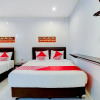 Отель OYO 90155 Landuh Merta Residence, фото 29
