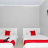 Отель RedDoorz Plus Near Transmart Kairagi Dua Manado, фото 13