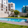 Отель Estoril Beachfront Condo, фото 13