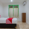 Отель Oyo 502 Wisma Bukti, фото 7