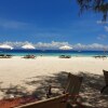 Отель Nungwi Inn Beach Cottages, фото 30