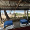 Отель Hill Myna Beach Cottages, фото 15