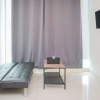 Отель Spacious and Cozy 1BR at Tree Park Apartment, фото 10