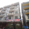 Отель Dongxing Guomen e Homestay, фото 1
