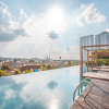 Отель RedLiving Apartemen Grand Kamala Lagoon - Kita Pro Tower Barclay North, фото 10