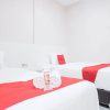 Отель Reddoorz Plus Near Deli Park Mall Medan, фото 8