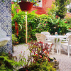 Отель Recanto das Flores - Sobrado com 2 suítes e maravilhoso jardim, фото 19