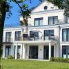 Отель Fehmarn-Ostseeferien Strandresidenz Vogelflug141 App 4Meerblick, фото 1