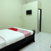 Отель OYO 752 Abz Guest House Syariah, фото 6