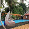 Отель OYO 1230 Kampoeng Osing Syariah Guesthouse, фото 6