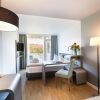 Отель Living Hotel am Olympiapark, фото 5