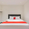 Отель RedDoorz Plus @ Pakuan Residence Tajur, фото 1