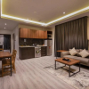 Отель دانة المروج للأجنحة الفندقية Danat Almourouj Hotel Suites, фото 1