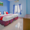 Отель Super OYO 90072 Apri Inn Syariah, фото 10