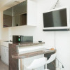 Отель Homey And Cozy Studio Room At Tree Park City Bsd Apartment, фото 14