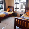 Отель Manacomfy - 14bed House - 4 Baths - Victoria Falls, фото 3