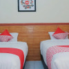 Отель OYO 1190 Griya Soeratin Residence Syariah, фото 8