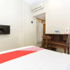 Отель Dewi Fortuna Guest House by OYO Rooms, фото 3