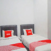 Отель SUPER OYO 91627 Wika Wiki Homestay, фото 4