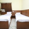 Отель SPOT ON 6856 Eshi Guest House, фото 13