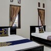 Отель OYO Life 92509 Maulana Guest House Simpur, фото 12