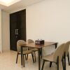 Отель Modern and Comfortable 2BR at The Empyreal Condominium Epicentrum Apartment, фото 14