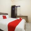 Отель RedDoorz near Terminal Bungur Asih, фото 16