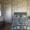 Отель The Snuggly Sheep Shepherd Hut Farm Stay, фото 2