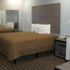 Отель Woodland Inn and Suites, фото 5