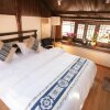 Отель Lijiang Jian Ai Hostel, фото 1