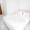 Отель Compact And Tidy Studio At Puncak Dharmahusada Apartment, фото 3