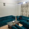 Отель AMs Den in DHA - Lovely two bedroom independent Apartment, фото 8